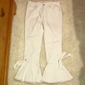 Cropped bell bottom with tie accent white jeans